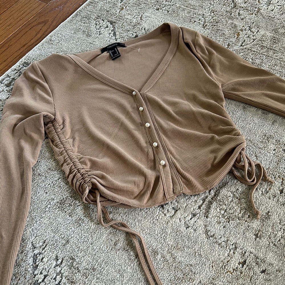 Long sleeve shirt with pearl button detailing